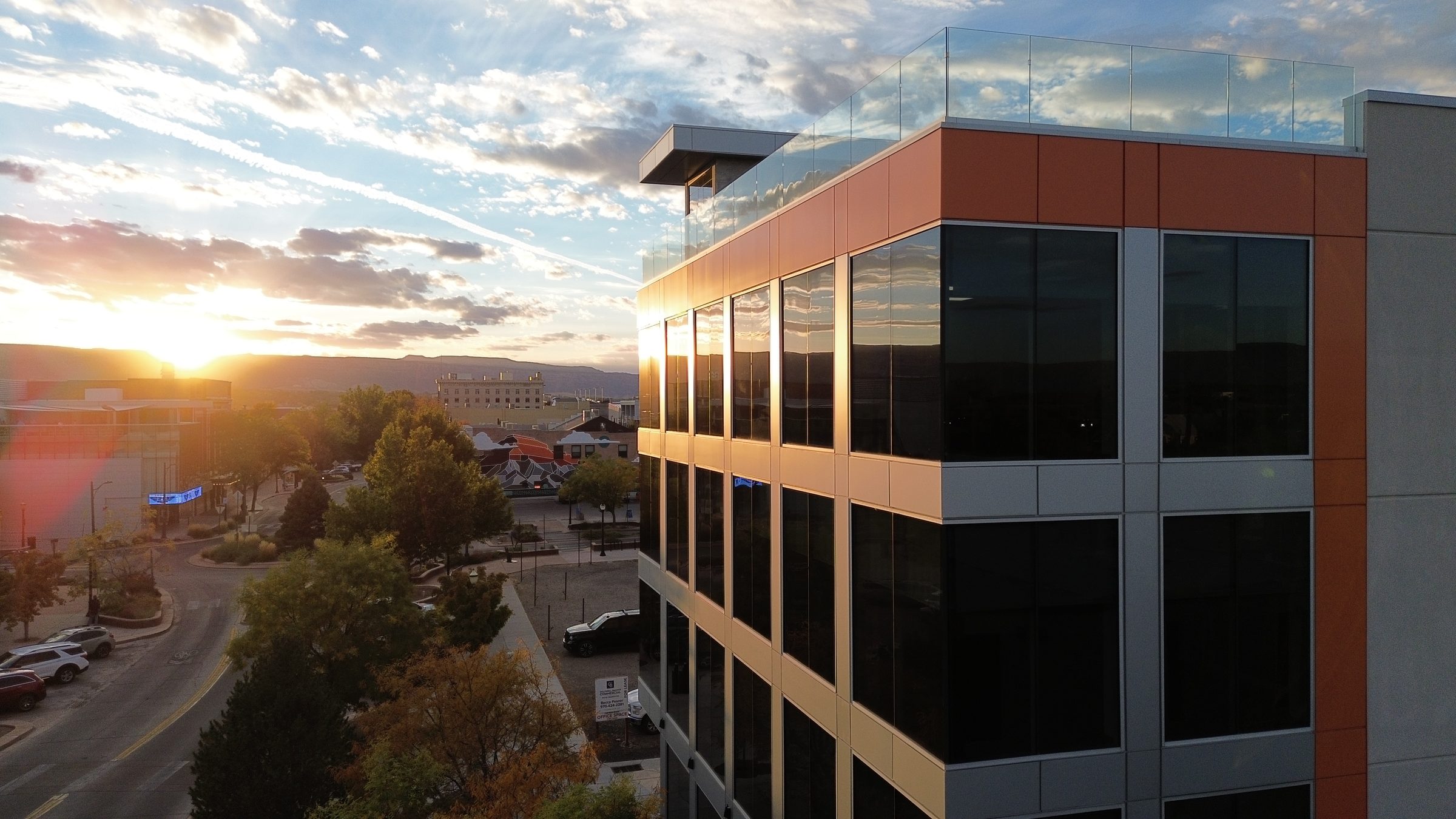 734 Main at sunset with the rooftop patio above