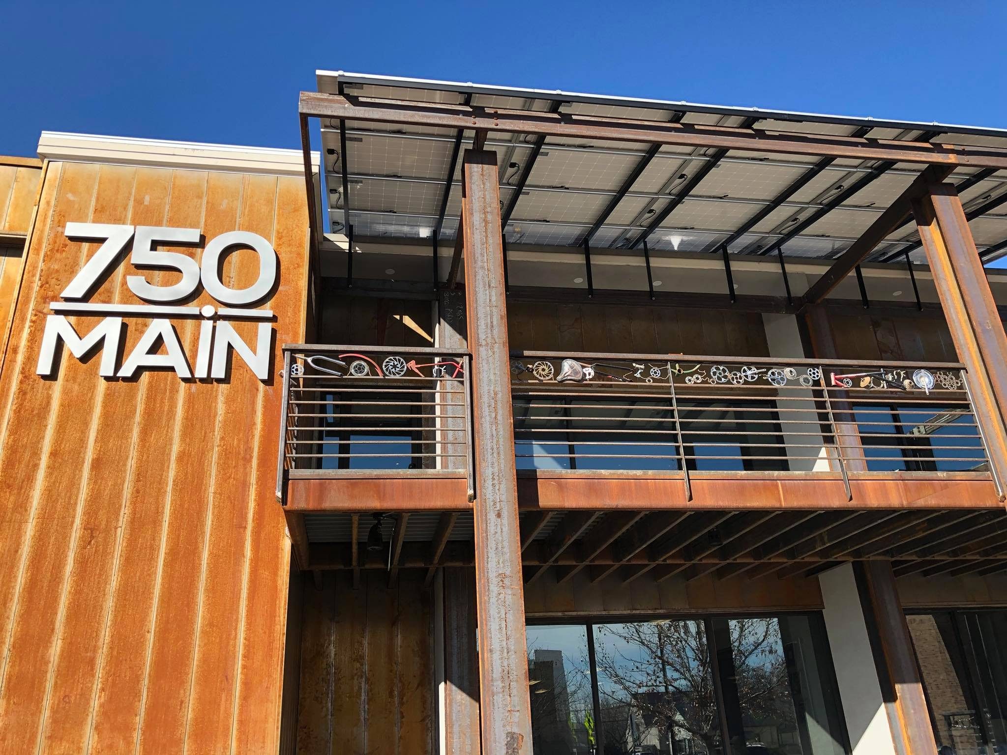 Solar canopy and bike art railing at 750 Main